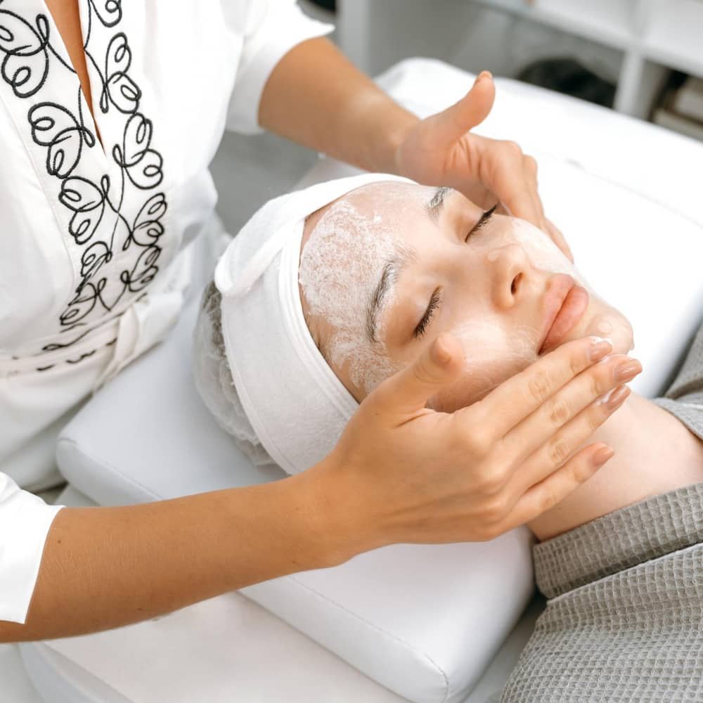 Calm, modern treatment room at Clara Medical Spa